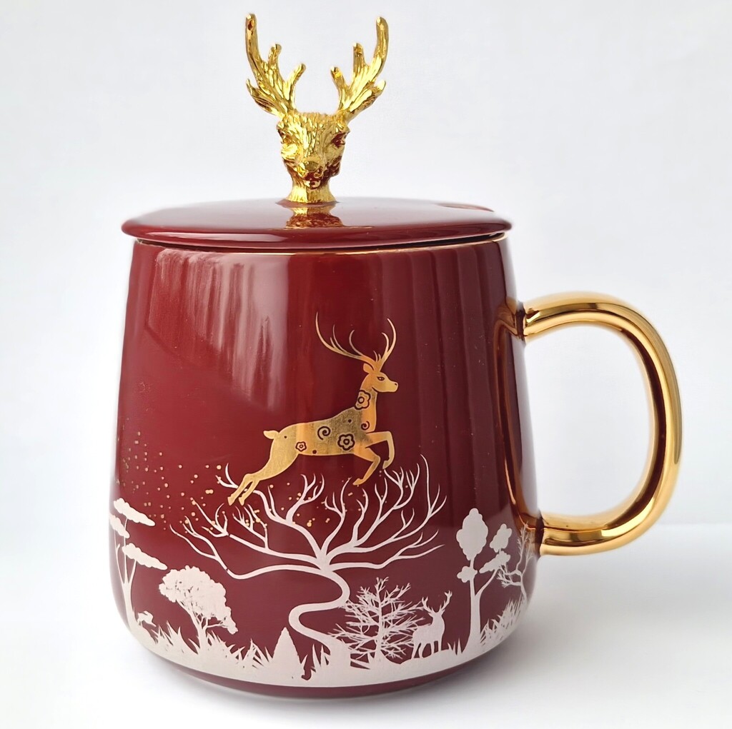 kalėdinis puodelis elnias