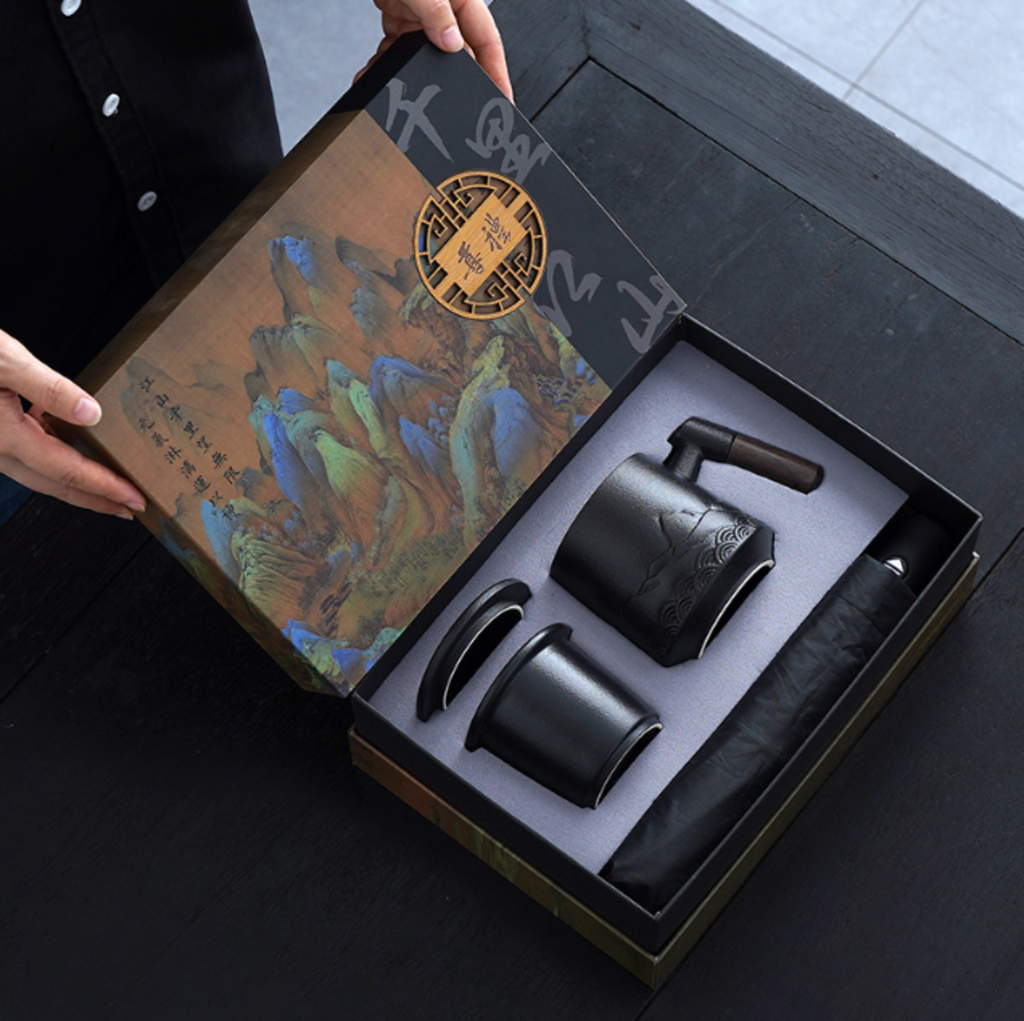 keraminis puodelis su skėčiu