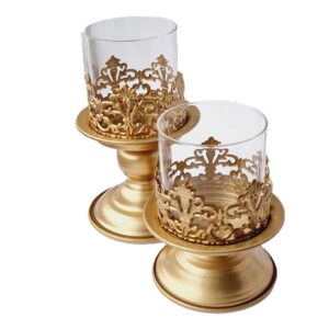 Karūnos formos auksinės žvakidės